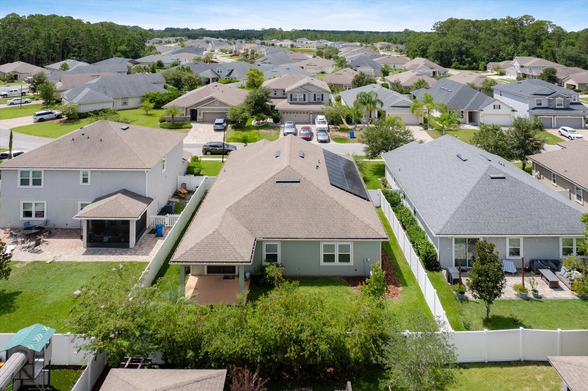 70 Quartz Place St. Augustine, FL 32086 - Photo 48 of 78 an aerial view of multiple houses with yard