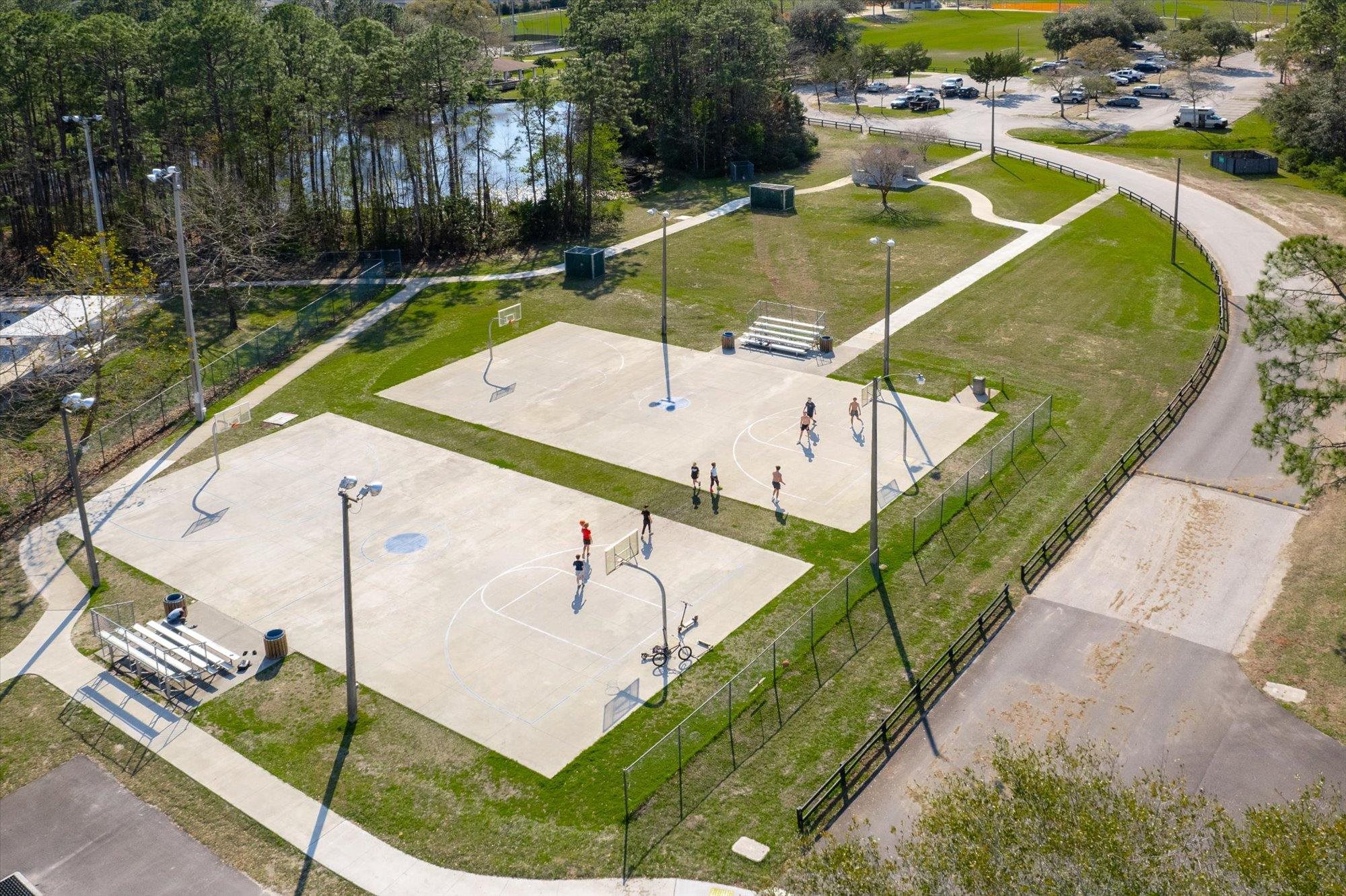 70 Quartz Place St. Augustine, FL 32086 - Photo 57 of 78 a view of a swimming pool with a patio and a garden