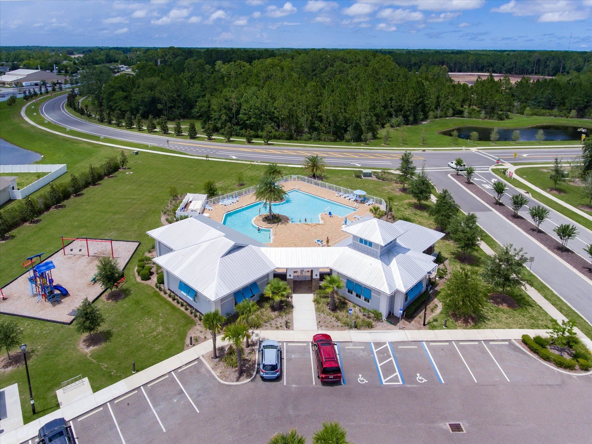 70 Quartz Place St. Augustine, FL 32086 - Photo 70 of 78 an aerial view of a house with a garden and lake view