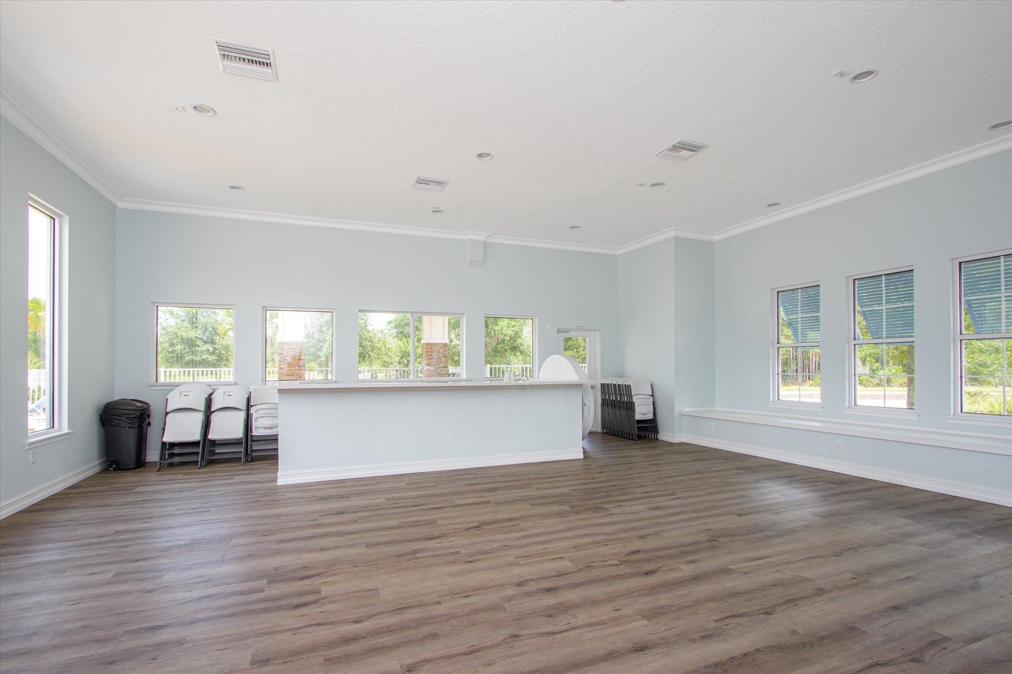 70 Quartz Place St. Augustine, FL 32086 - Photo 75 of 78 a view of empty room with wooden floor and fan