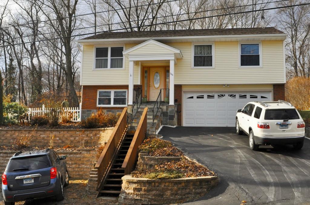a car parked in front of a house