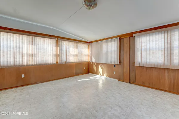 a kitchen with cabinets a sink and appliances