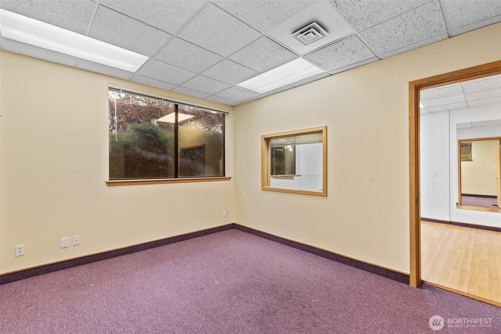 151 South Worthen Street, Unit 3 Wenatchee, WA 98801 - Photo 8 of 8 a view of an empty room with a window