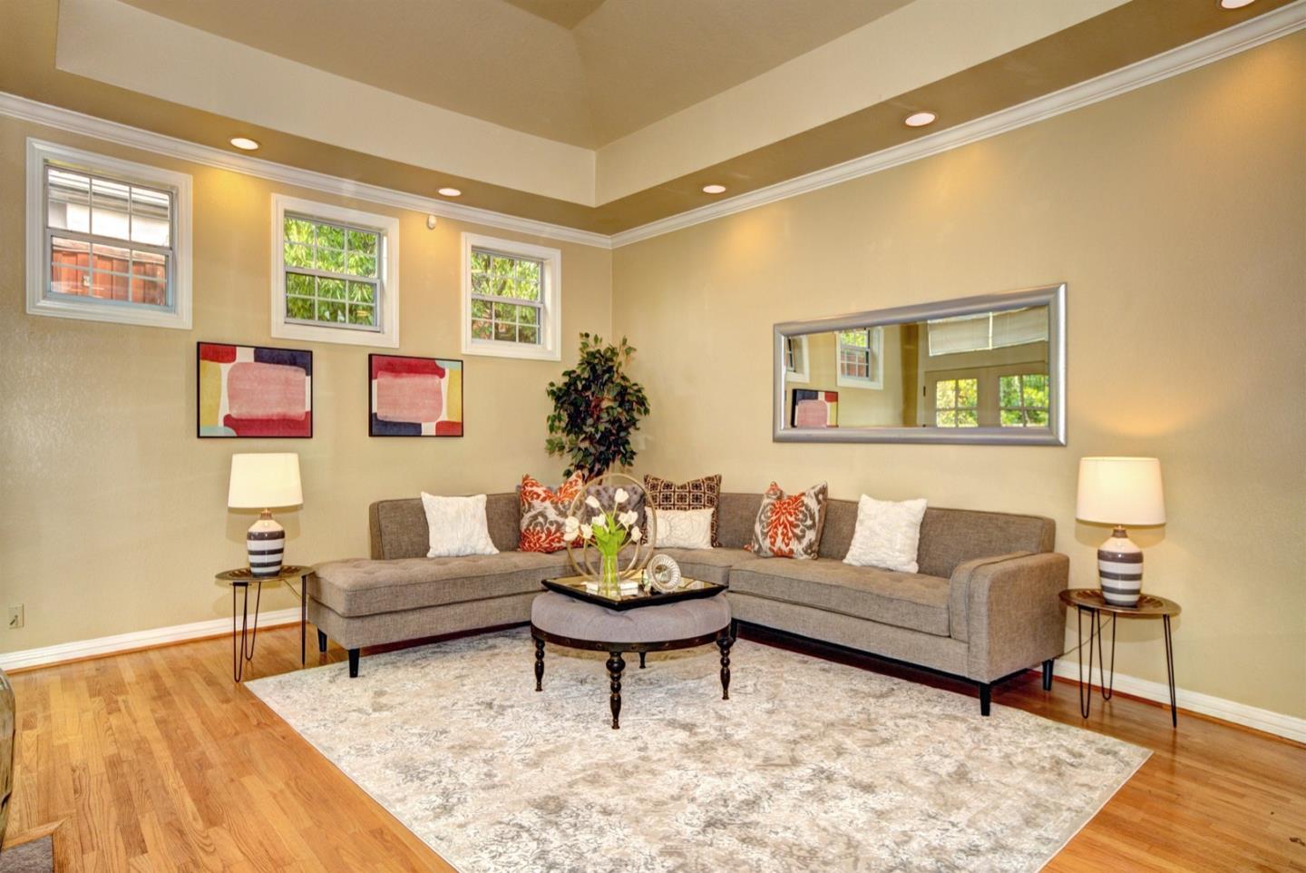 10171 Carmen Road Cupertino, CA 95014 - Photo 19 of 42 a living room with furniture and wooden floor