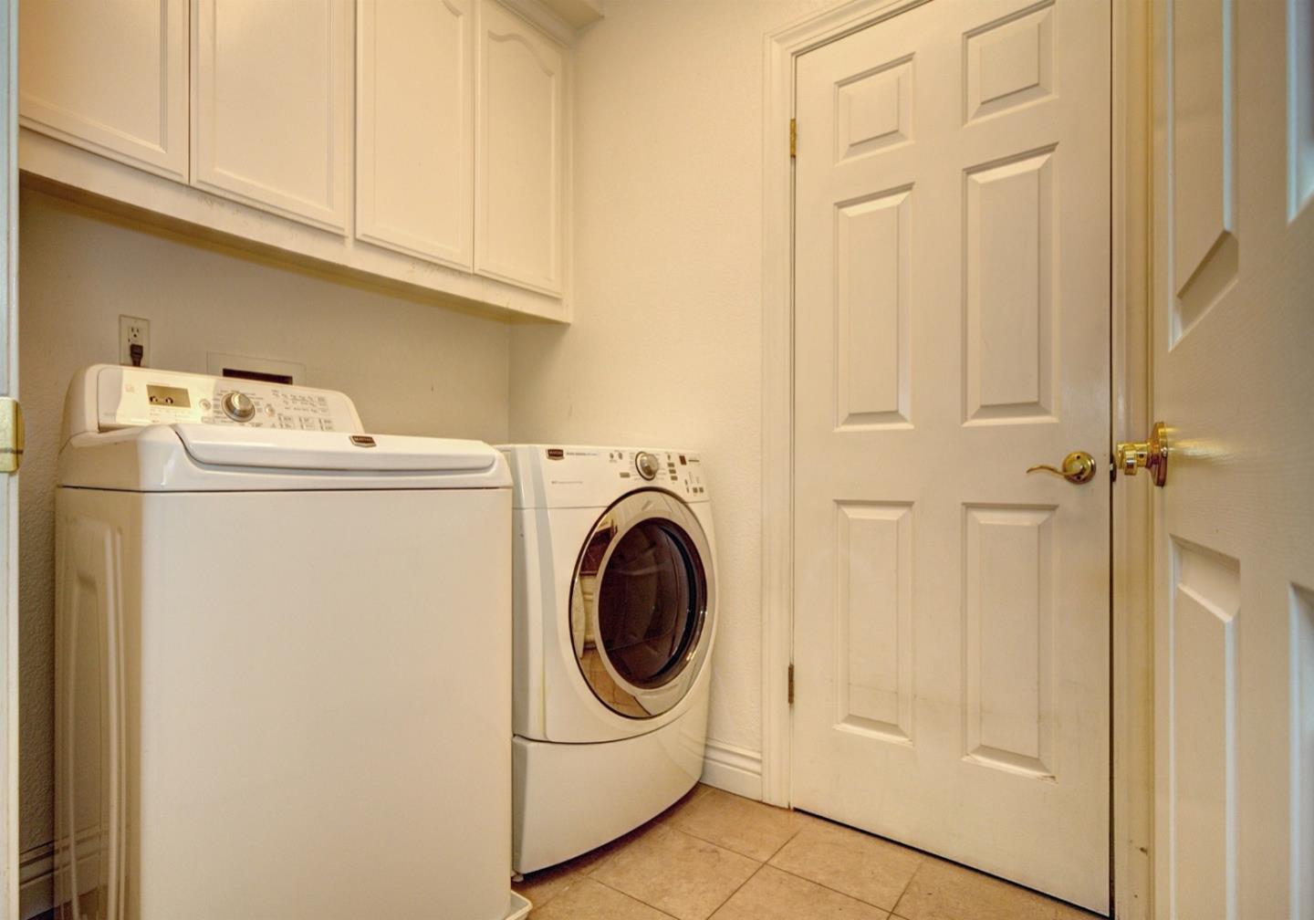 10171 Carmen Road Cupertino, CA 95014 - Photo 23 of 42 a utility room with dryer and washer