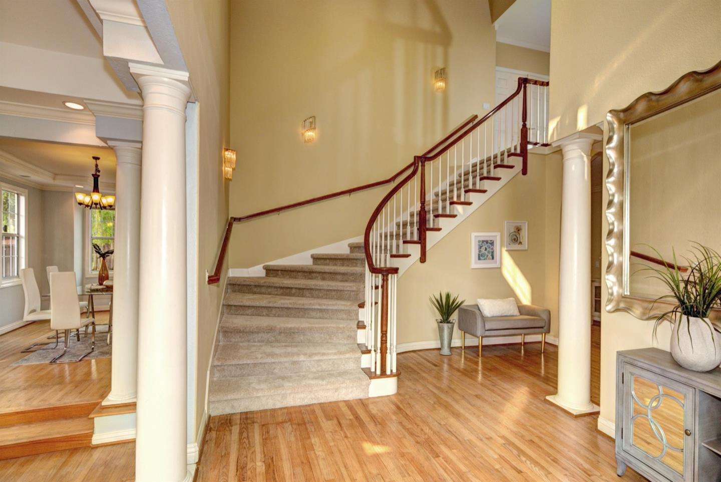 10171 Carmen Road Cupertino, CA 95014 - Photo 24 of 42 a view of entryway and hall with wooden floor