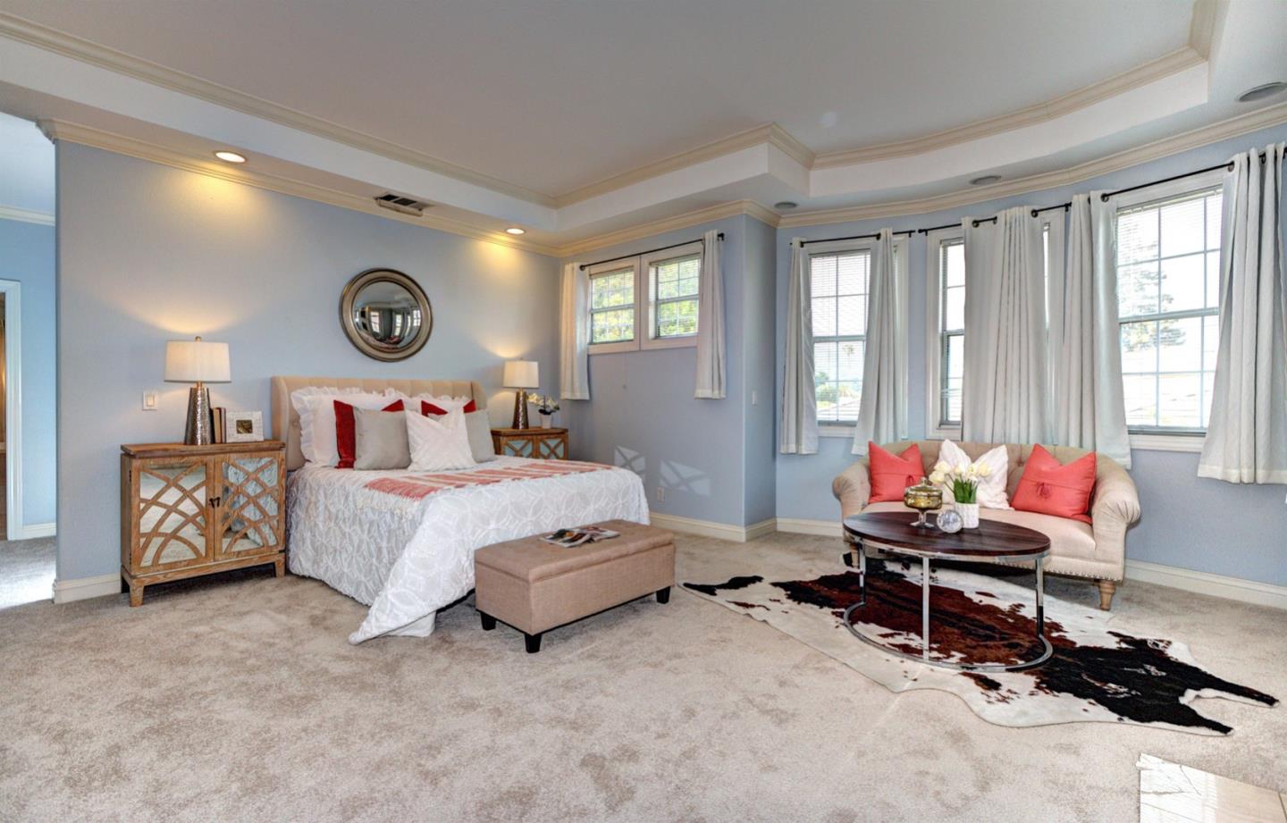 10171 Carmen Road Cupertino, CA 95014 - Photo 25 of 42 a bedroom with a bed and a window