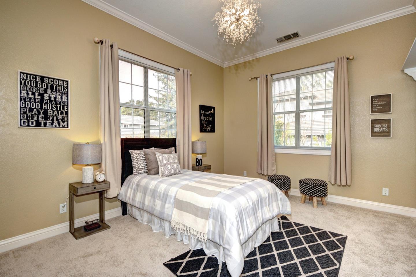 10171 Carmen Road Cupertino, CA 95014 - Photo 33 of 42 a bedroom with a bed and a window