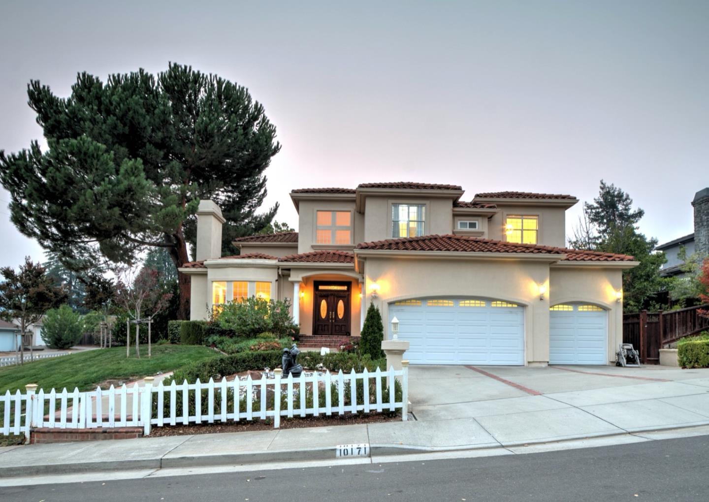 10171 Carmen Road Cupertino, CA 95014 - Photo 5 of 42 front view of a house with a garden