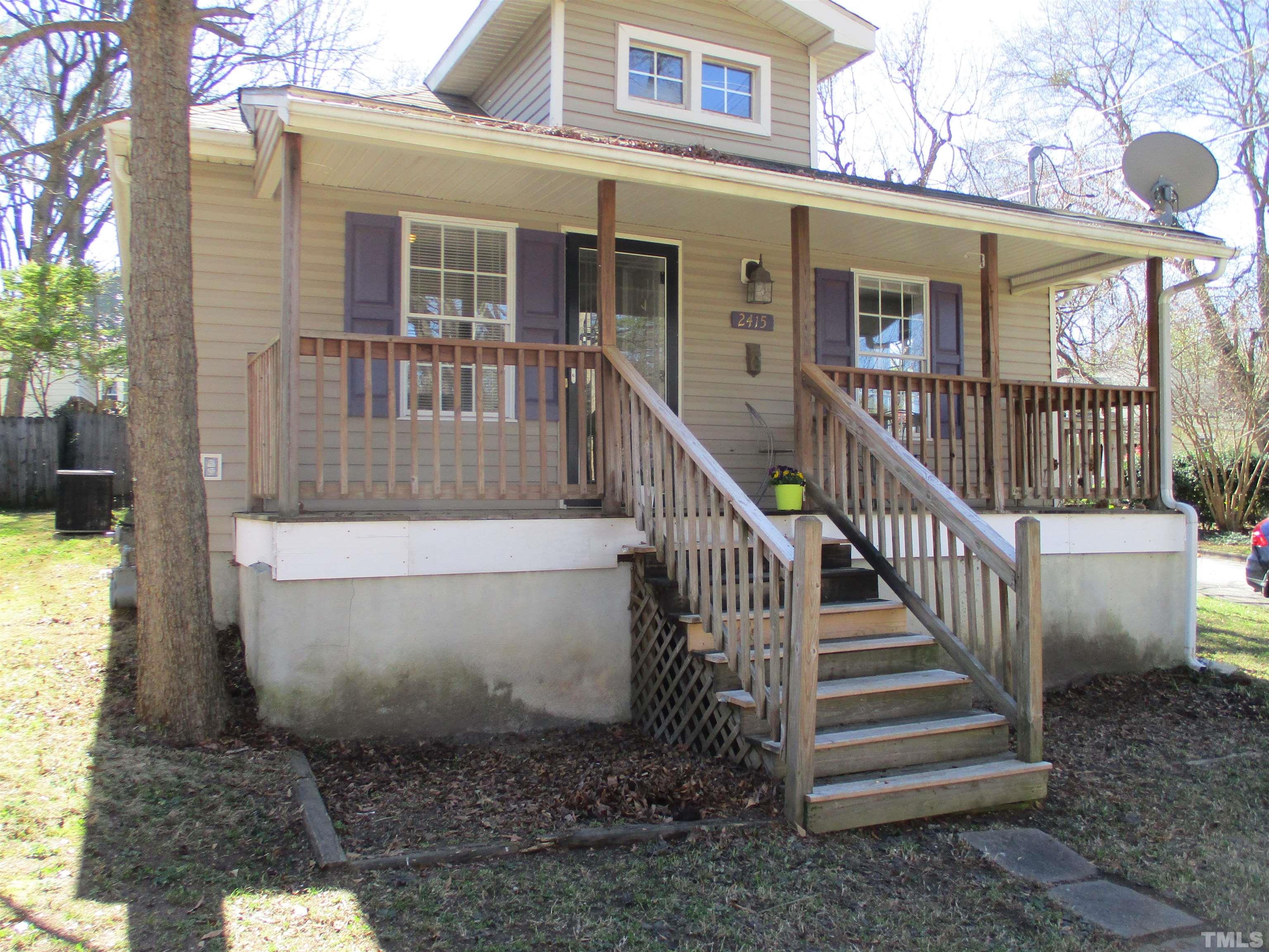 2415 Bedford Avenue Raleigh, NC 27607 - Photo 1 of 12 a view of a house with wooden floor and a window