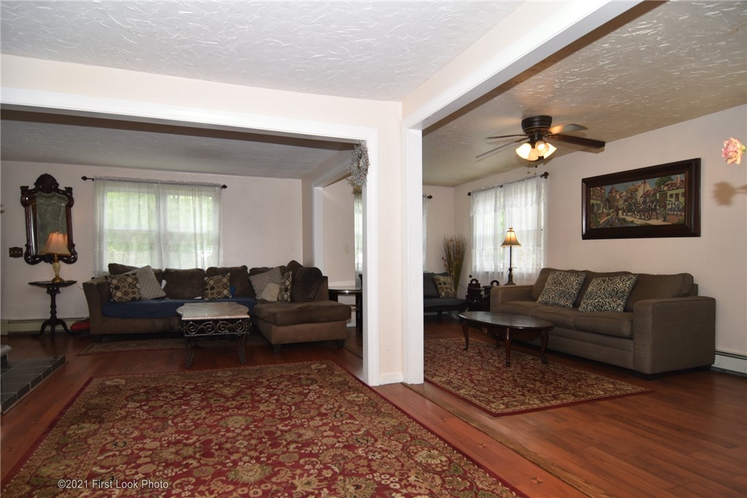 107 Bonnet Shores Road Narragansett, RI 02882 - Photo 15 of 33 Large living room.