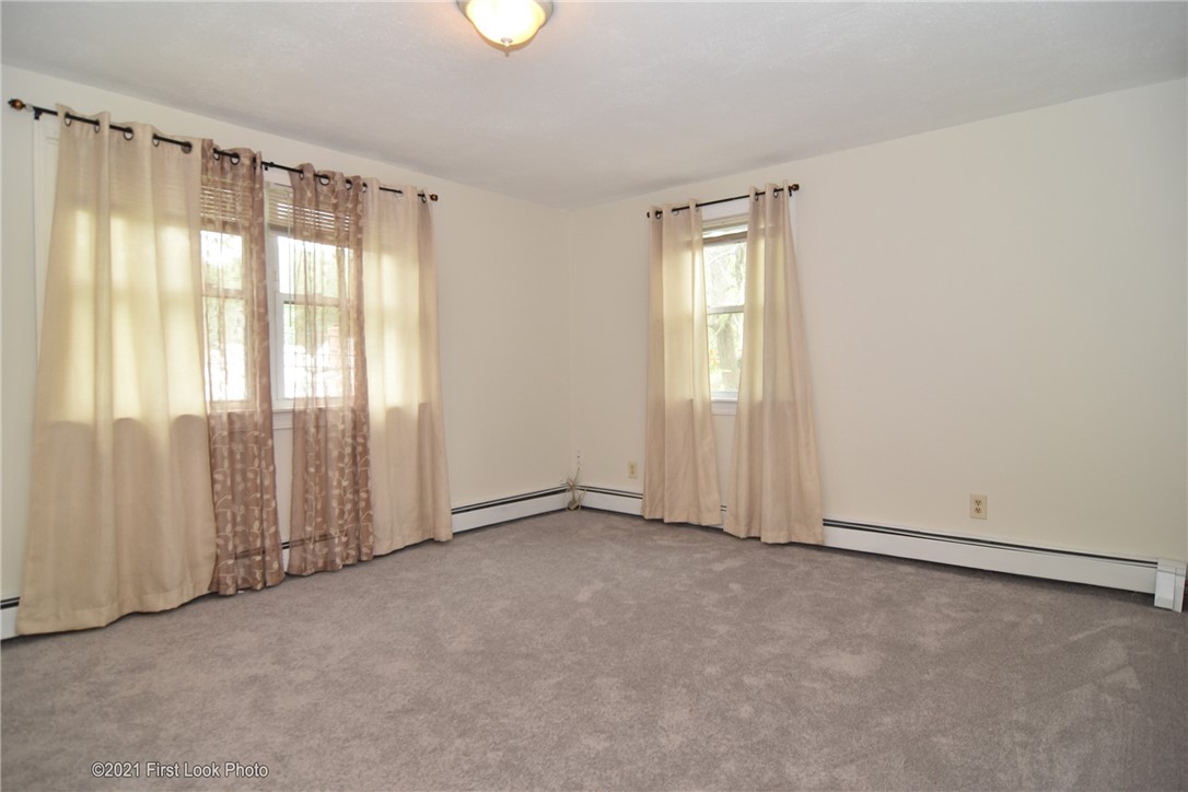 107 Bonnet Shores Road Narragansett, RI 02882 - Photo 24 of 33 Large upstairs bedroom with walk in closet