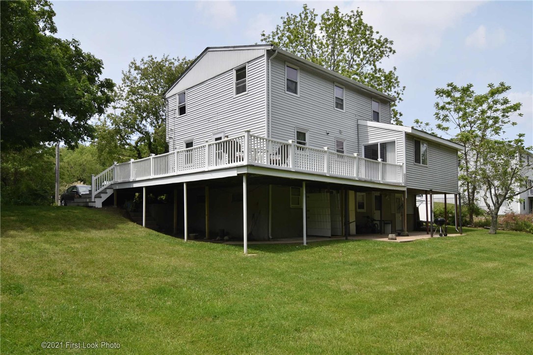 107 Bonnet Shores Road Narragansett, RI 02882 - Photo 3 of 33 Large deck for entertaining and enjoying the good weather.