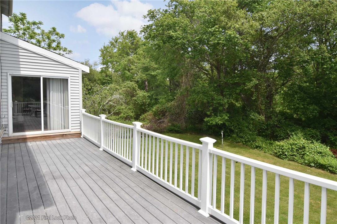 107 Bonnet Shores Road Narragansett, RI 02882 - Photo 5 of 33 Deck leading into the sunroom.