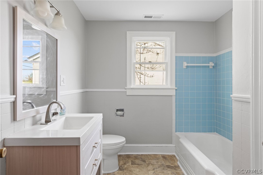 3510 East River Road Petersburg, VA 23803 - Photo 15 of 19 a bathroom with a sink a toilet and shower