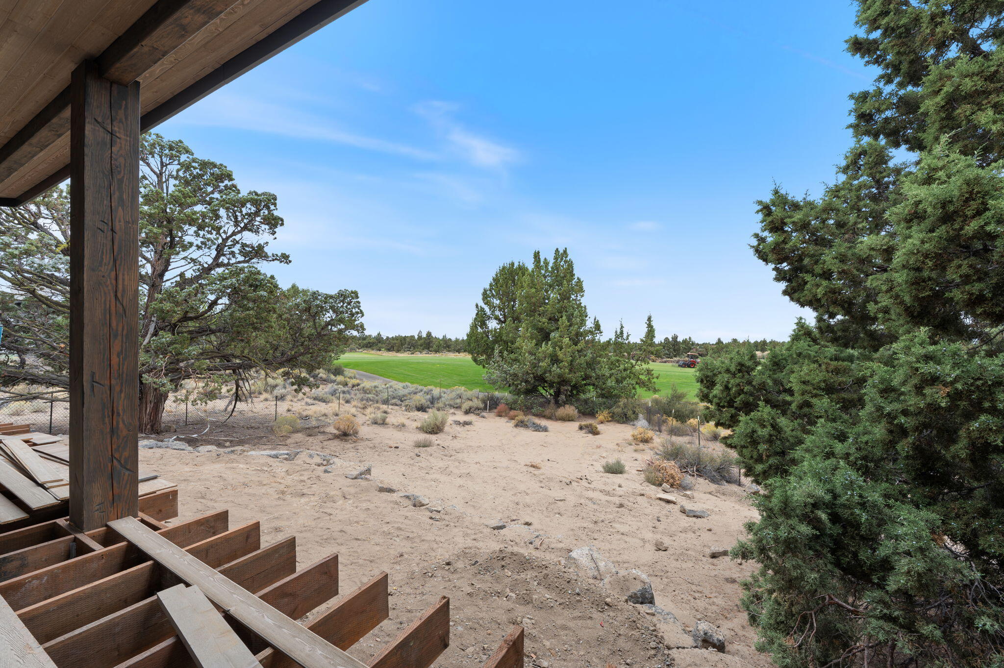 22936 Ghost Tree Lane Bend, OR 97701 - Photo 48 of 74 a view of a yard with a tree