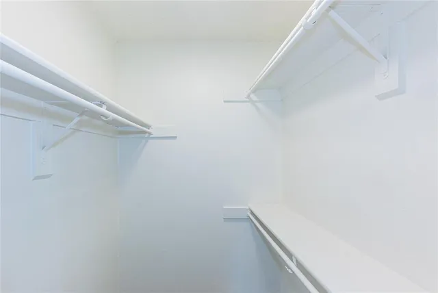 a view of a room with racks on the wall