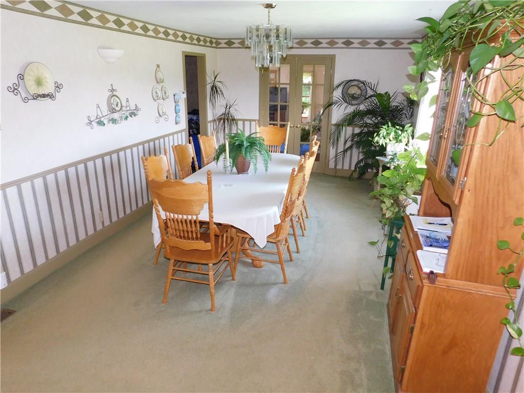 7191 Patton Road Hartstown, PA 16131 - Photo 19 of 25 DINING ROOM WITH FRENCH DOORS TO L.R.