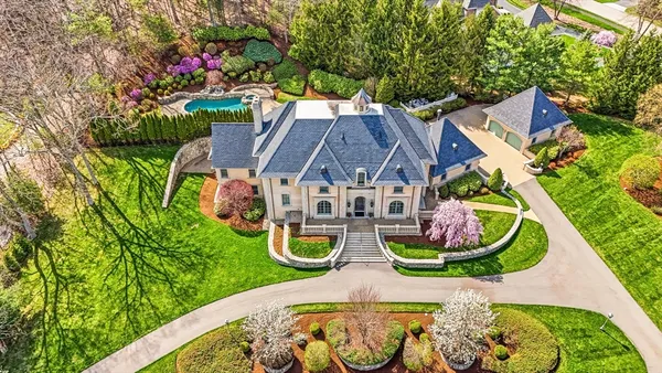 an aerial view of a house with garden space sitting space
