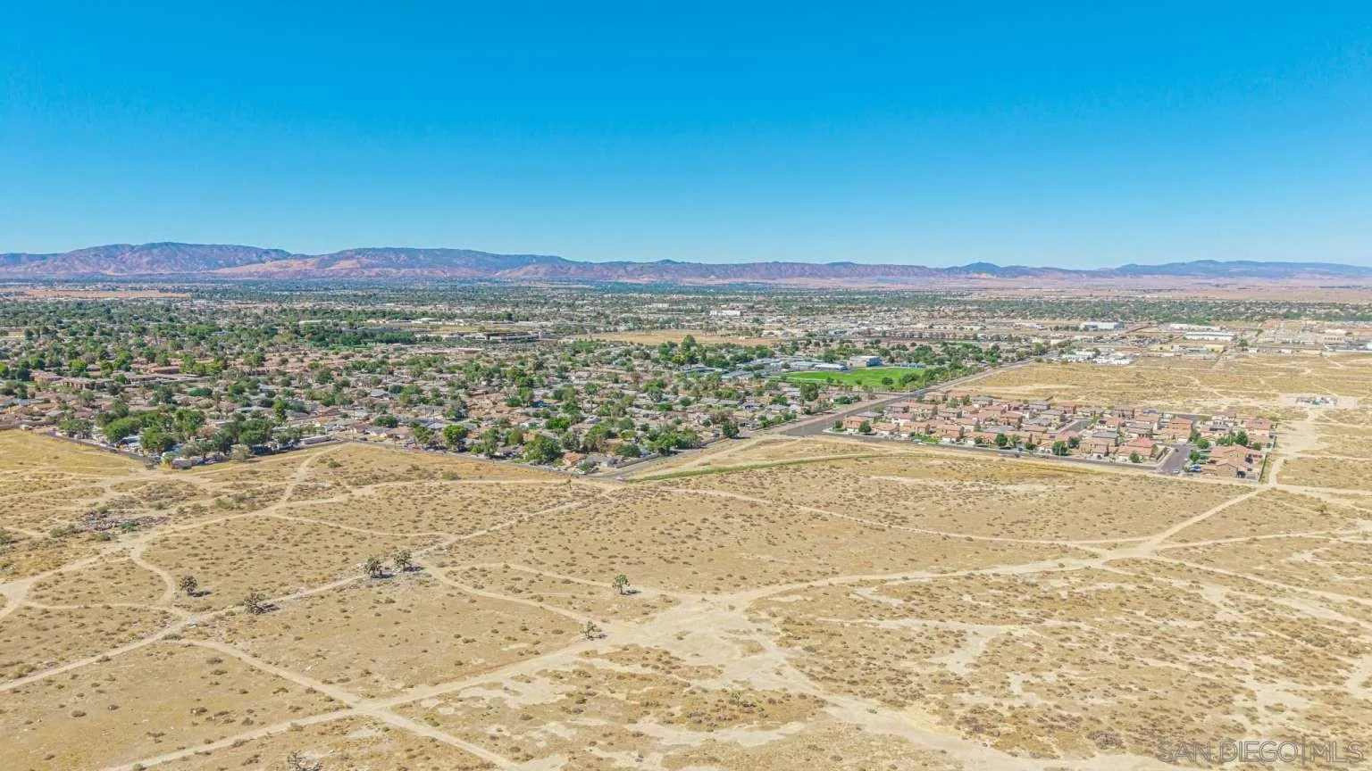 0 Challenger Way, Unit 5 Lancaster, CA 93535 - Photo 22 of 43 a view of an ocean beach and mountain