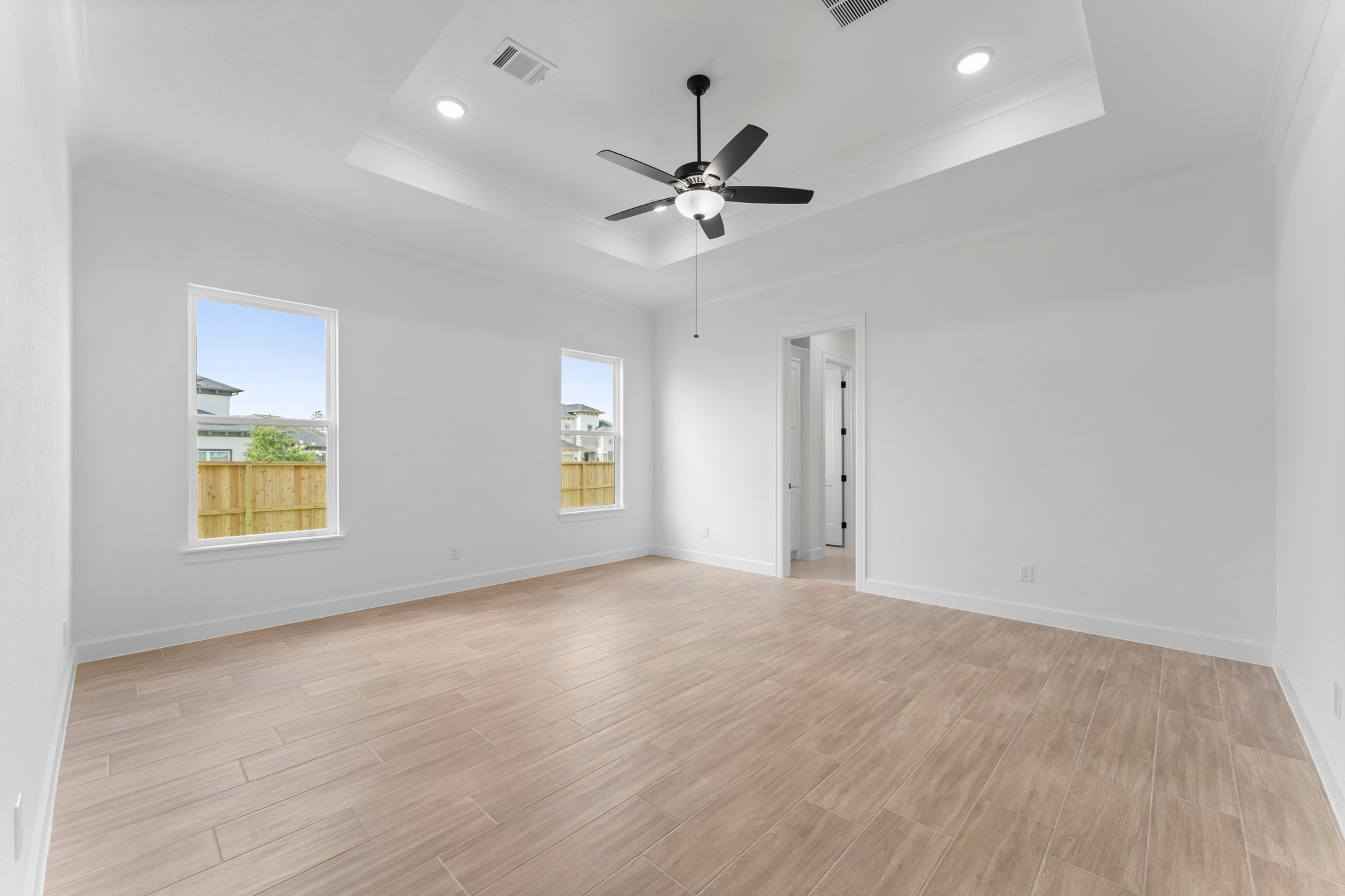 24807 Pacific Dunes Lane Spring, TX 77389 - Photo 18 of 50 an empty room with windows and fan