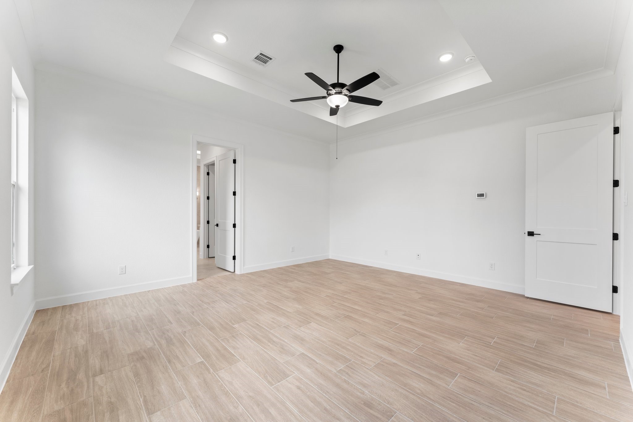 24807 Pacific Dunes Lane Spring, TX 77389 - Photo 19 of 50 a view of empty room with wooden floor