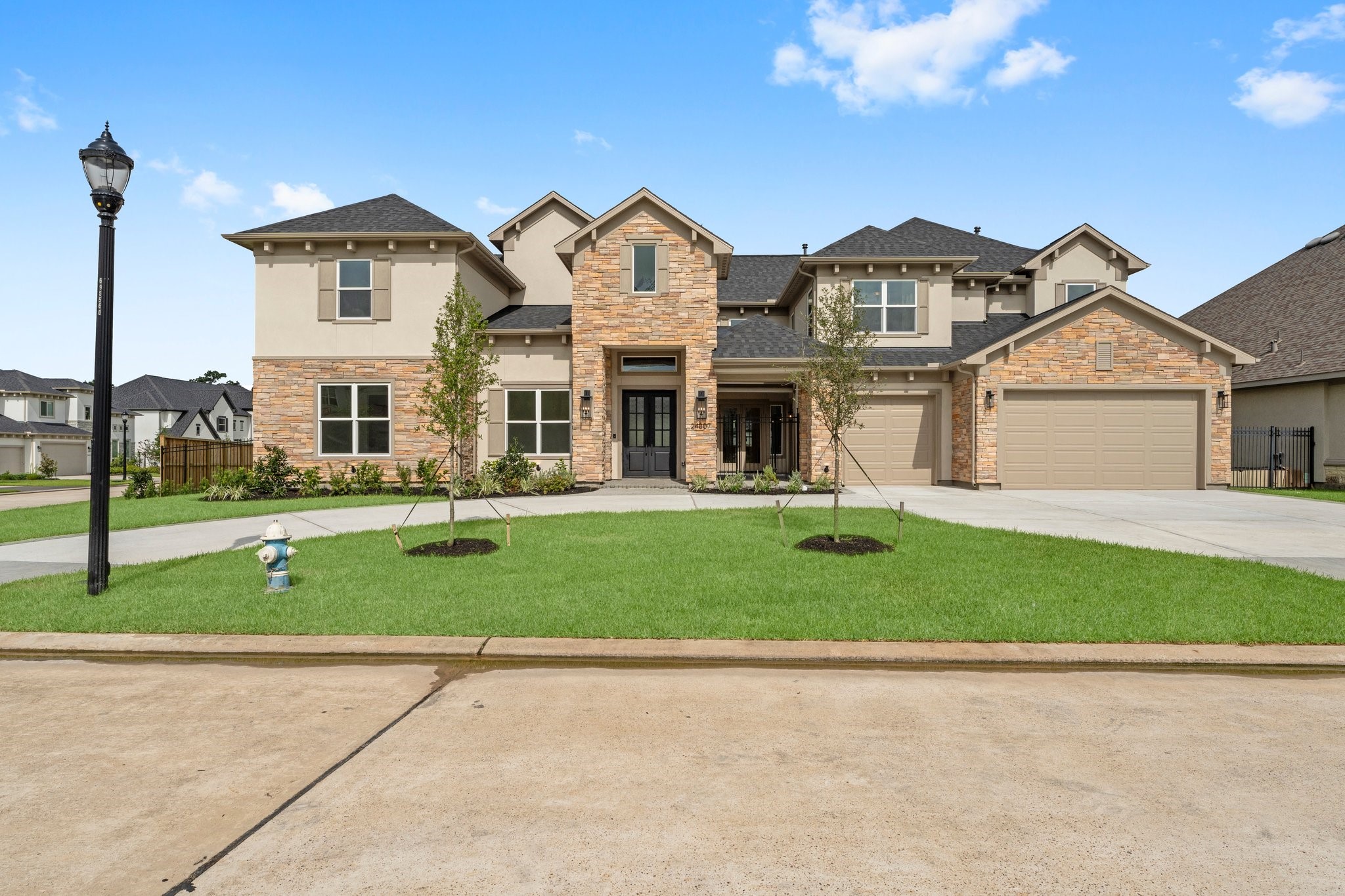 24807 Pacific Dunes Lane Spring, TX 77389 - Photo 2 of 50 front view of a house with a yard