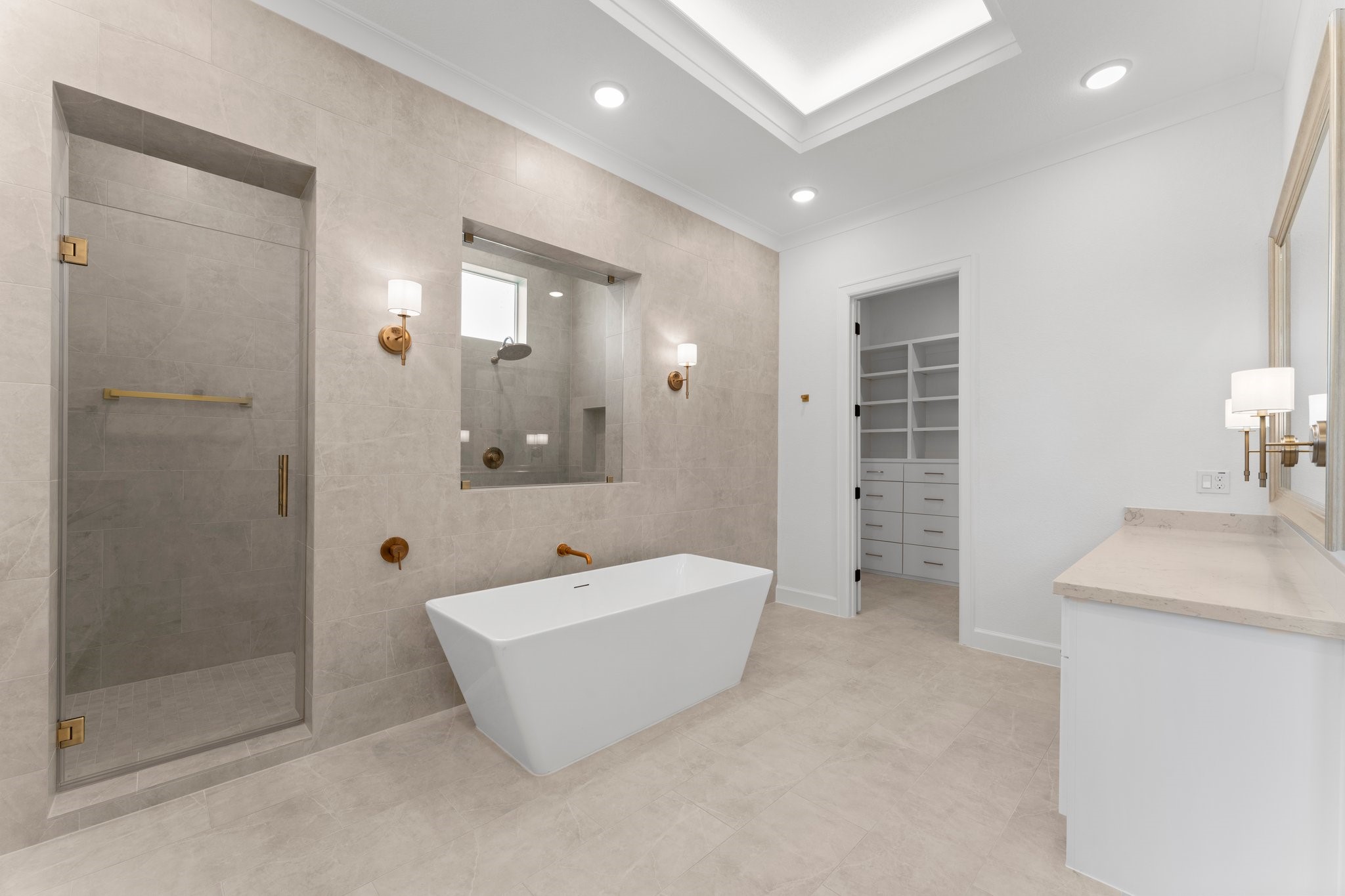 24807 Pacific Dunes Lane Spring, TX 77389 - Photo 21 of 50 a spacious bathroom with a tub a sink and shower