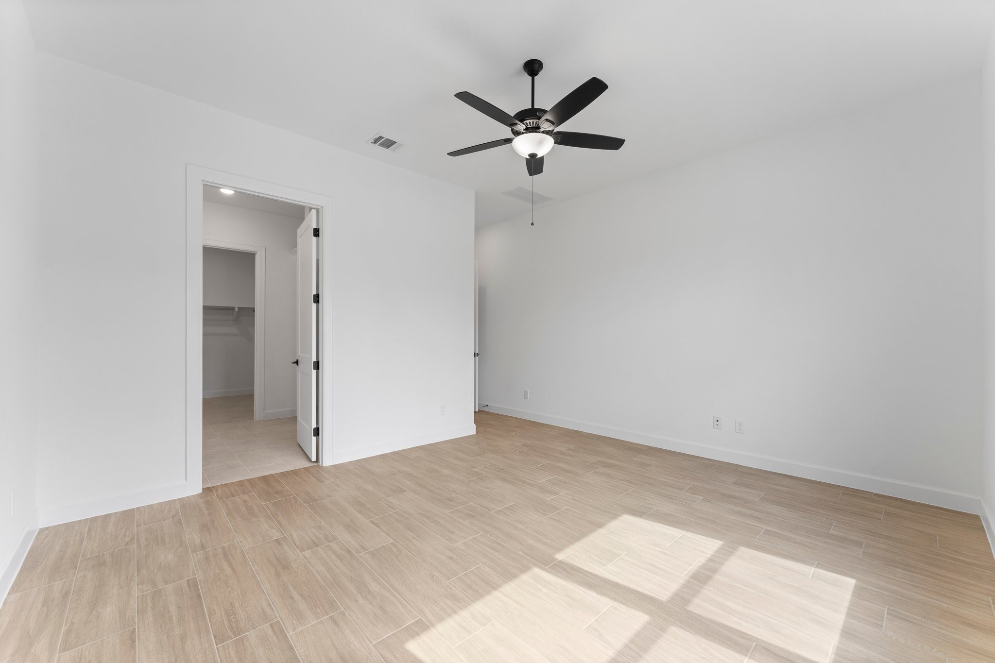 24807 Pacific Dunes Lane Spring, TX 77389 - Photo 25 of 50 a view of a big room with closet and fan
