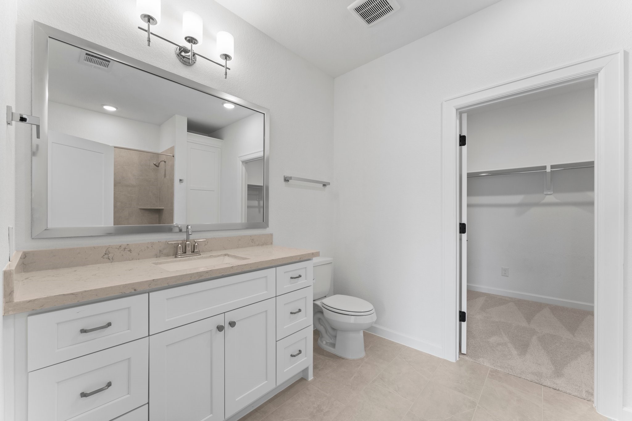 24807 Pacific Dunes Lane Spring, TX 77389 - Photo 29 of 50 a bathroom with a granite countertop sink mirror and toilet