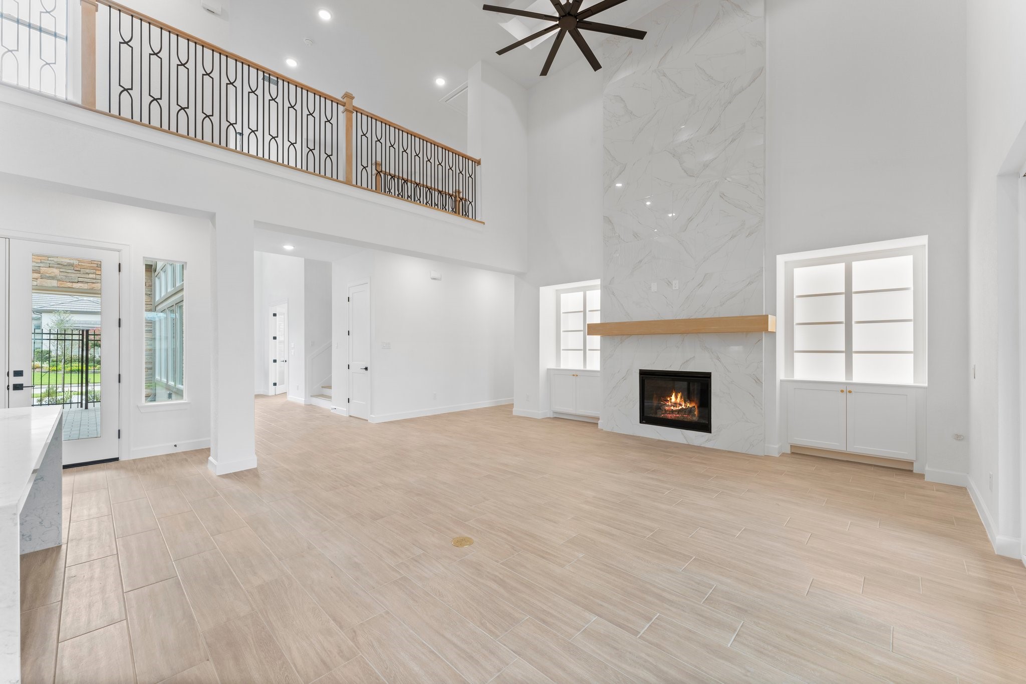24807 Pacific Dunes Lane Spring, TX 77389 - Photo 5 of 50 a view of an empty room with a fireplace and a window