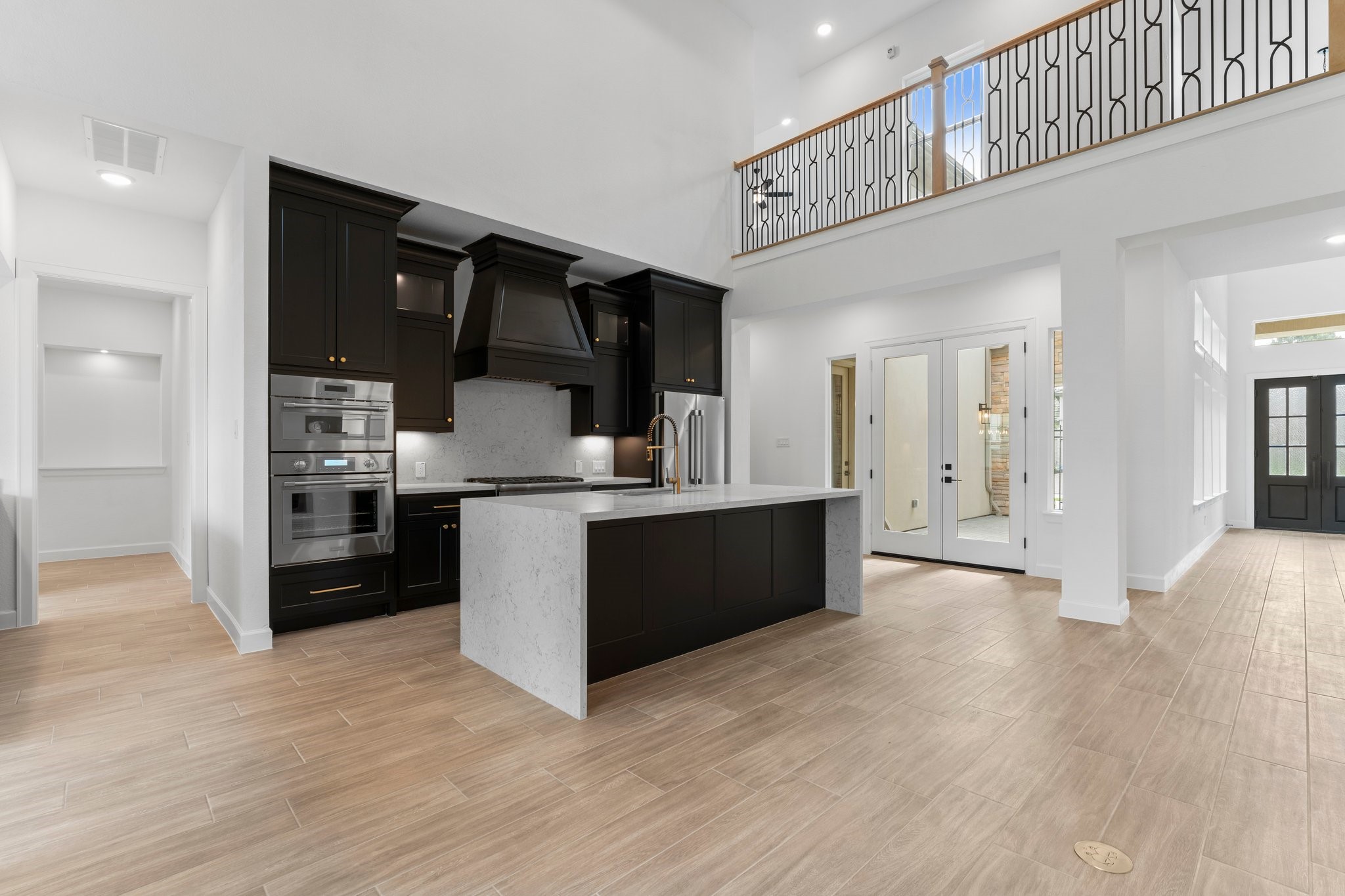24807 Pacific Dunes Lane Spring, TX 77389 - Photo 7 of 50 a kitchen with stainless steel appliances granite countertop a refrigerator and a sink