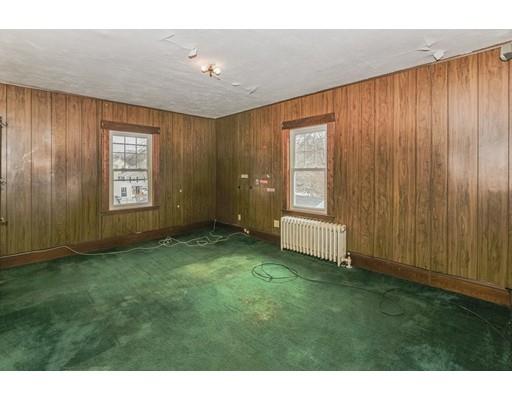 32 Birch Street Dedham, MA 02026 - Photo 14 of 25 a view of an empty room with a window