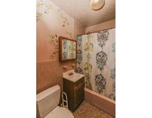 32 Birch Street Dedham, MA 02026 - Photo 15 of 25 a bathroom with a sink toilet and shower