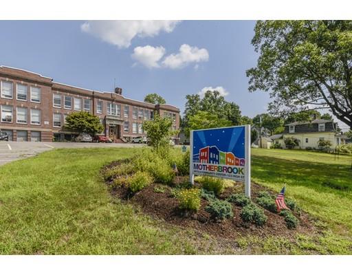 32 Birch Street Dedham, MA 02026 - Photo 21 of 25 a view of a house with a yard