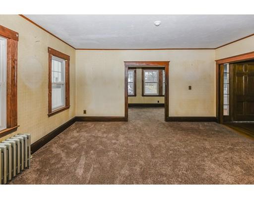 32 Birch Street Dedham, MA 02026 - Photo 5 of 25 a view of an empty room with window