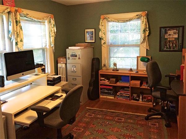 171 Wolcott Road Brookline, MA 02467 - Photo 7 of 14 a room with furniture and a window