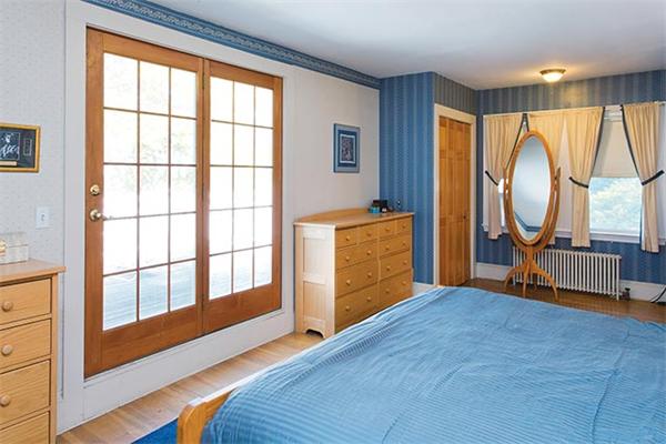 171 Wolcott Road Brookline, MA 02467 - Photo 8 of 14 a view of an empty room with a window