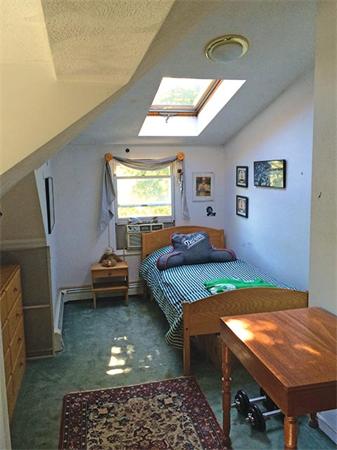 171 Wolcott Road Brookline, MA 02467 - Photo 10 of 14 a bedroom with bed and window