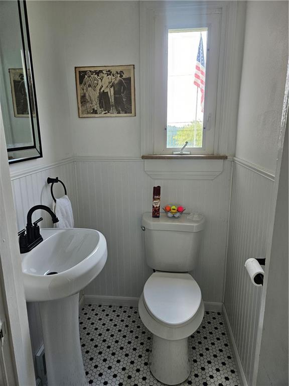 485 Harvey Road Foxburg, PA 16036 - Photo 14 of 25 a bathroom with a toilet a sink and a window