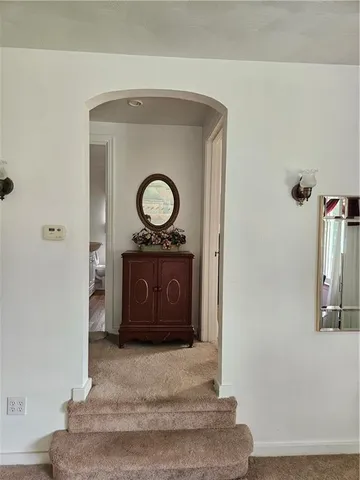 a bedroom with a bed and a closet