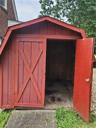 a view of an empty room with windows