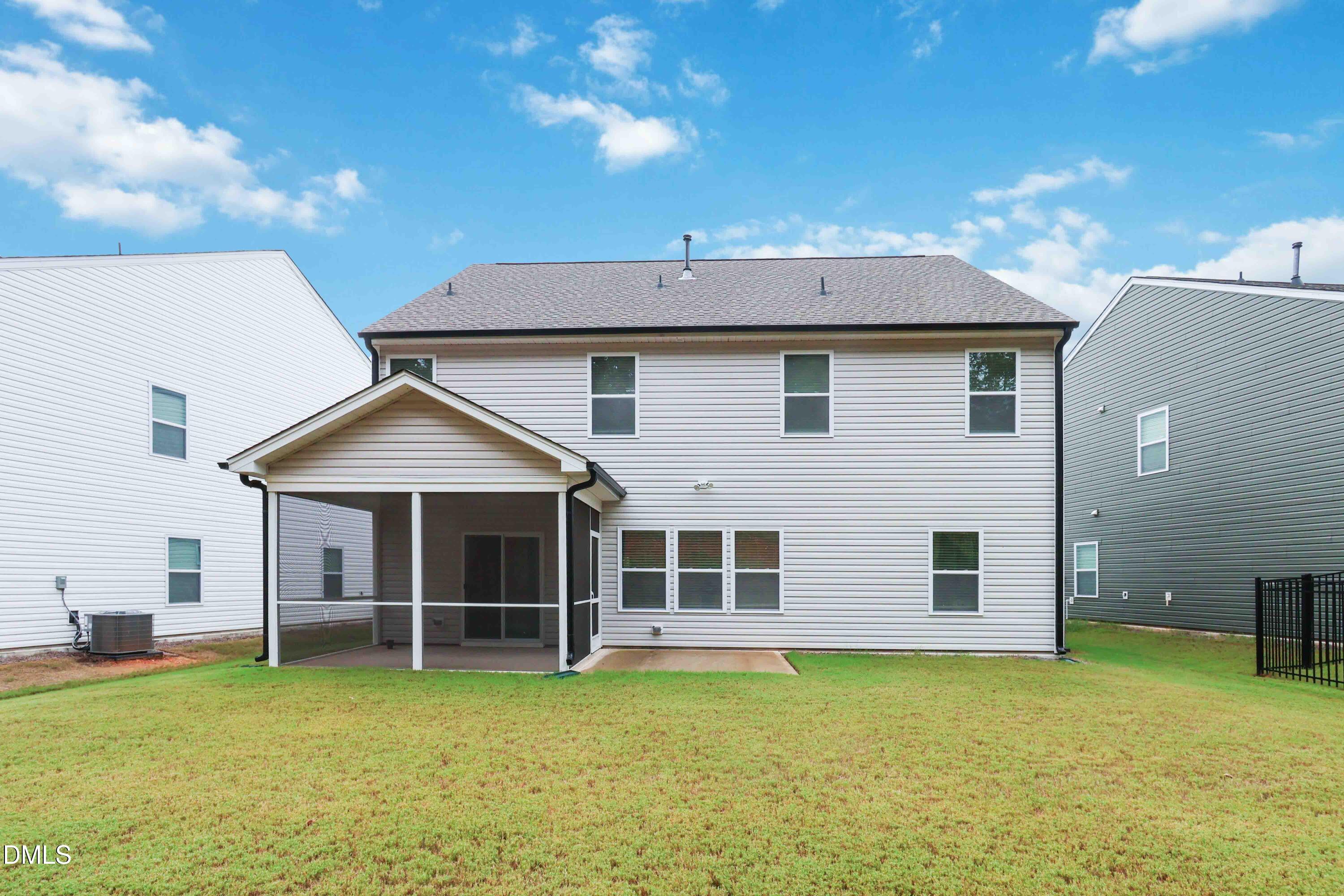 396 Bent Willow Drive Clayton, NC 27527 - Photo 36 of 36 a view of a house with a backyard