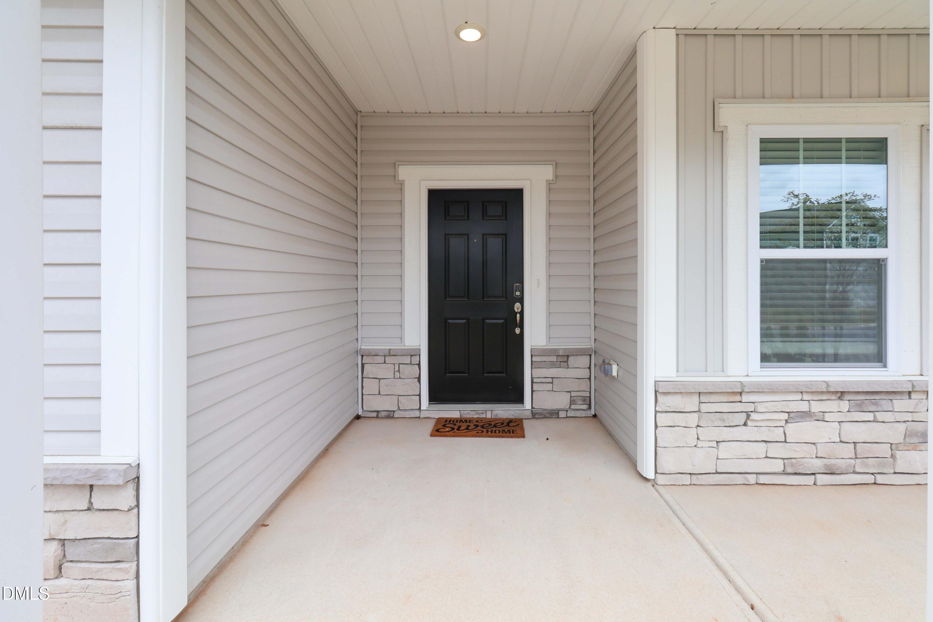 396 Bent Willow Drive Clayton, NC 27527 - Photo 4 of 36 a view of front door of house