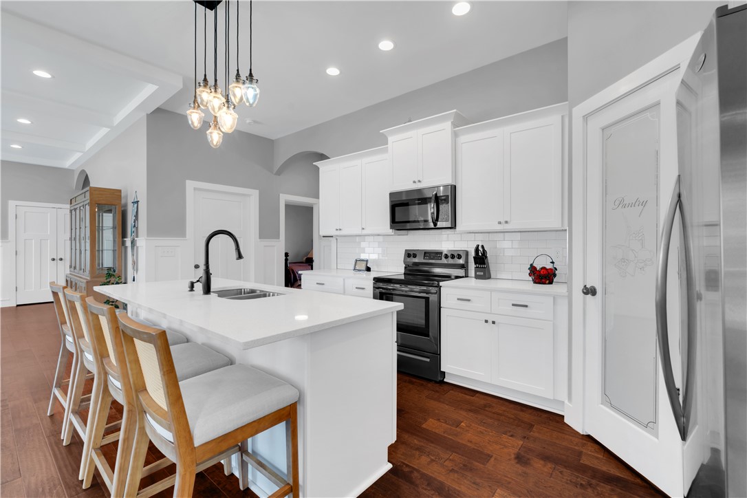 181 Amberwood Drive Anderson, SC 29621 - Photo 9 of 28 Bright and open kitchen with modern amenities, perfect for gatherings and culinary creations.