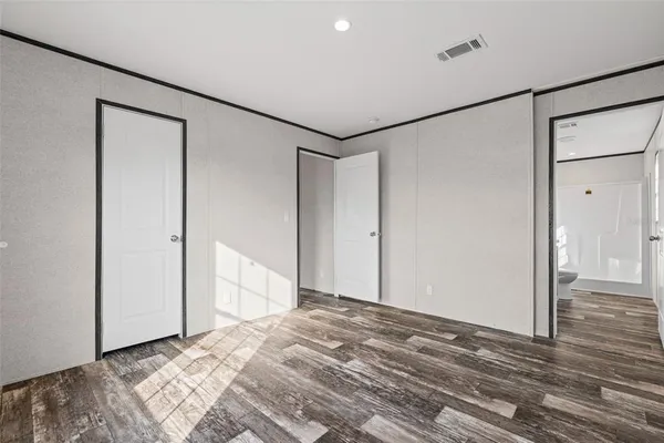 a view of a room with a bathroom and a shower