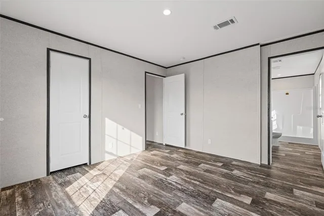 a view of a room with a bathroom and a shower