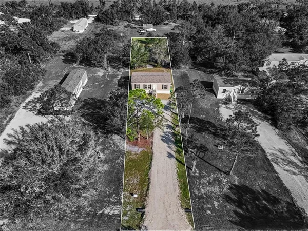 a view of a pathway both side of yard