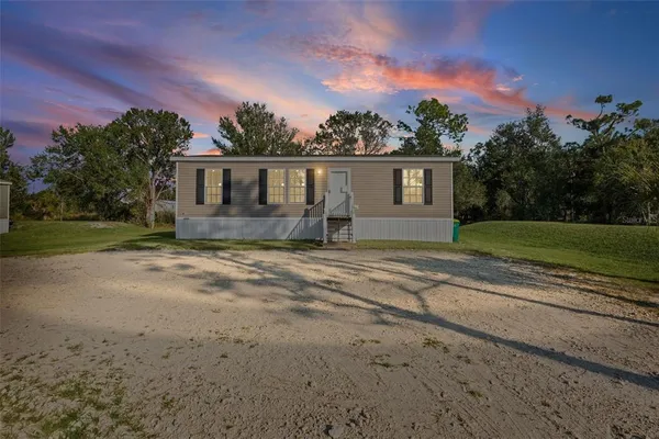 front view of house with a yard