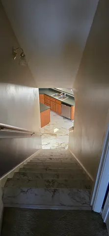 a view of a backyard of the house